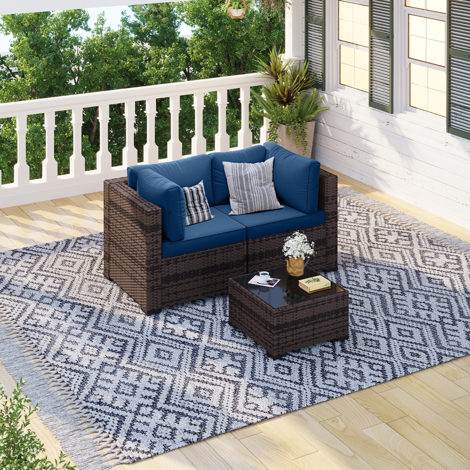 3-Piece Brown Rattan Sofa Set Navy Blue Cushions Coffee Table